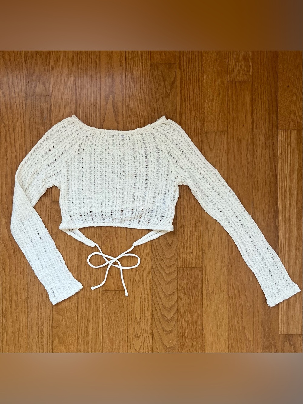 Bershka white knit long sleeve crop top with tie back detail, size M